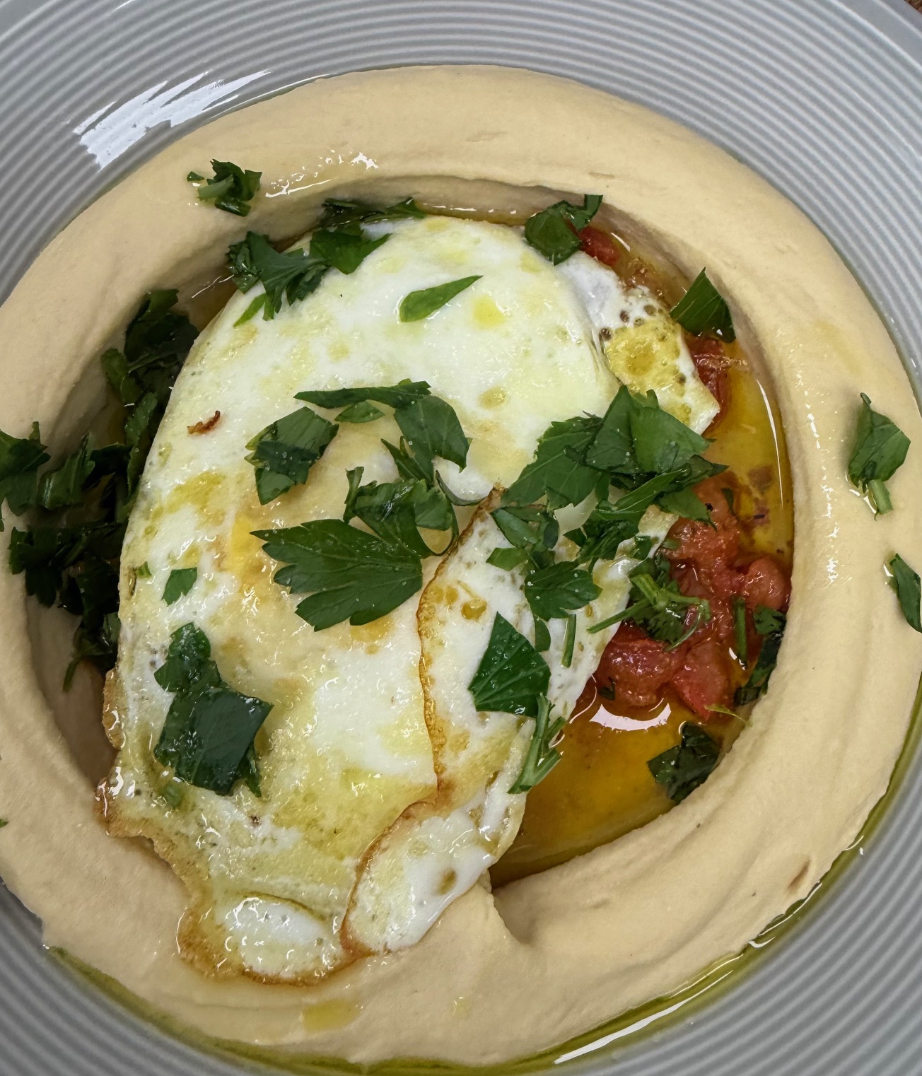 Hamshuka — egg on hummus